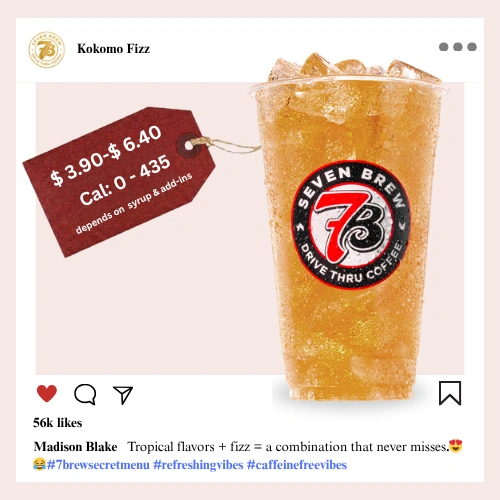 7 Brew Kokomo Fizz Soda in a clear cup with golden orange tropical color — caffeine-free 7 Brew secret menu fizz drink